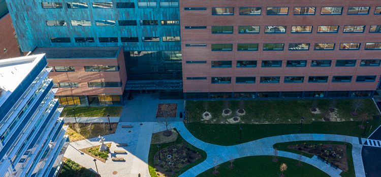 An aerial view of the UConn Pharmacy building and surrounding campus walkways.