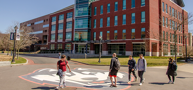 students walking on uconn campus